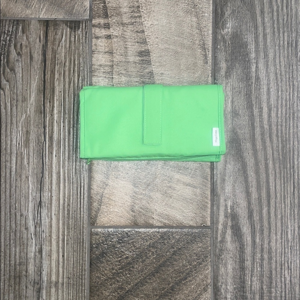 Magellan’s green nylon medicine holder with Velcro Strap closure.